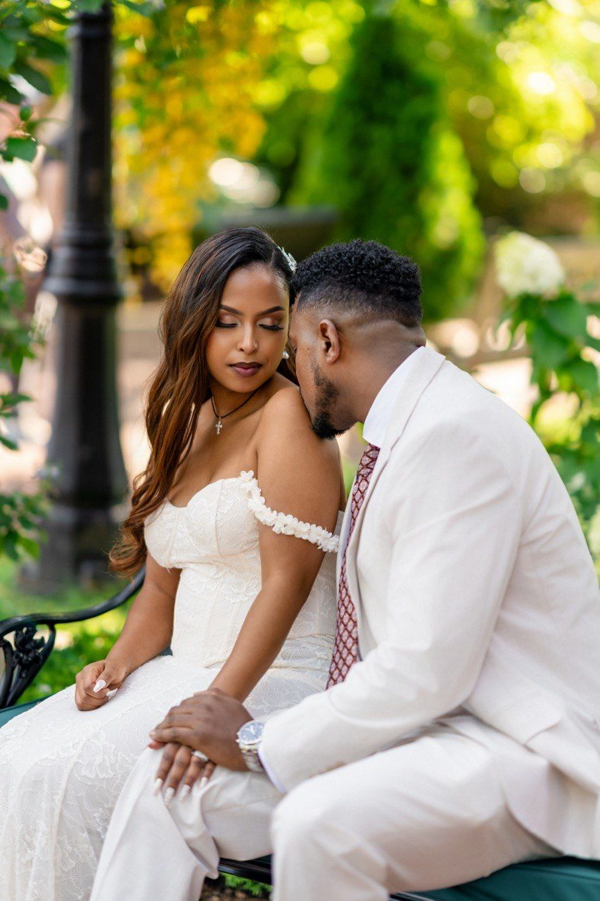 Tariku and Meskerem on a garden bench